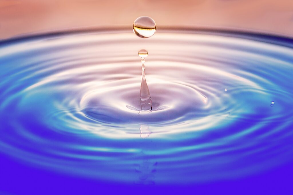 Drops of water ripple through a pool of water like the effects of our good deeds when use our superpowers for good.