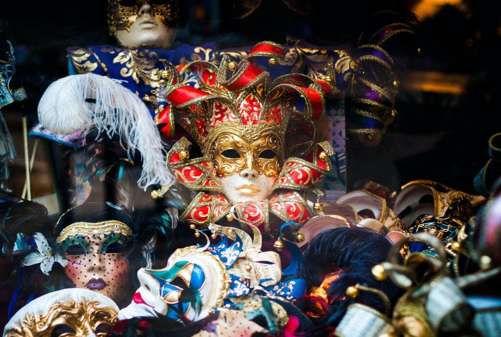 A collection of ornate masks pointing to the covering we wear when we tell the story of happiness when we are really struggling.