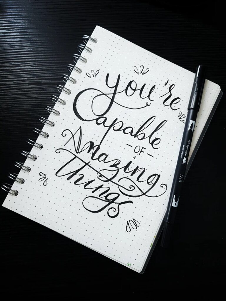 A notepad displaying the mindset: You’re capable of amazing things