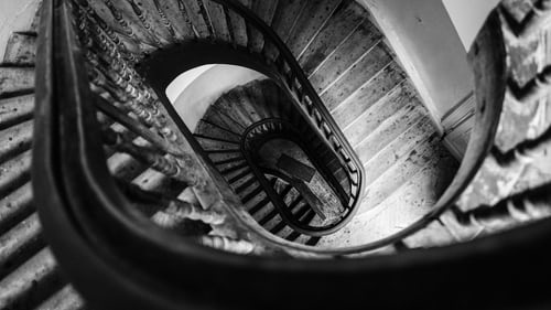 A Deep Winding Staircase representing the author's journey towards diagnosis