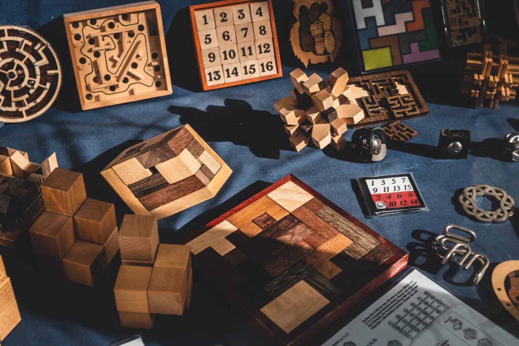 A collection of wooden problem solving games pointing to the author's  new solution oriented title